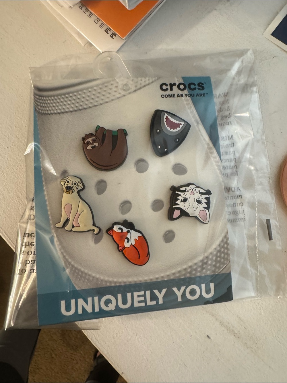 CROCS Jibbitz Charm Pack with White, Orange, Brown, Black, Pink Accents